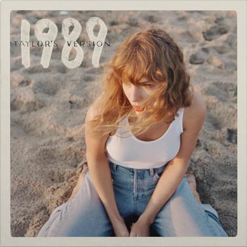Taylor Swift album cover, "1989", with a sandy background.
