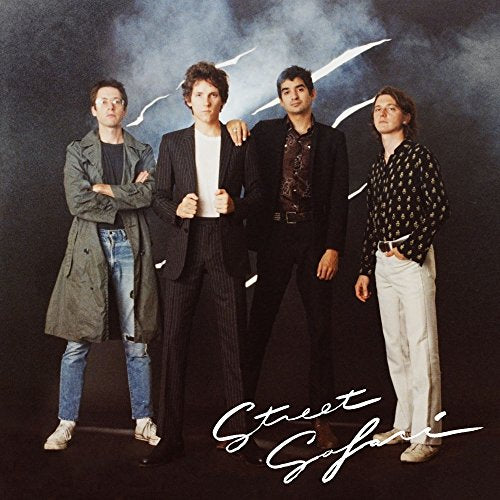 CD cover: Four men in suits and casual wear, with "Street Safari" text.