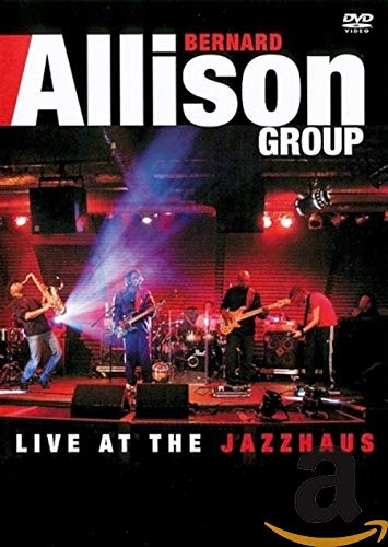 Bernard Allison Group performing live on stage with instruments and lights.