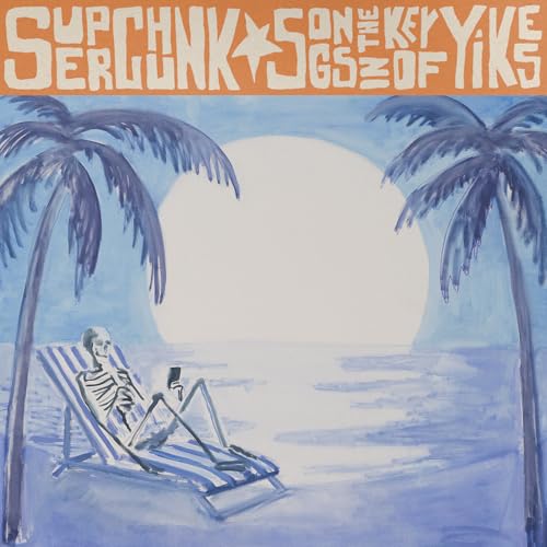 Skeleton relaxing on a beach chair with a phone, under palm trees.