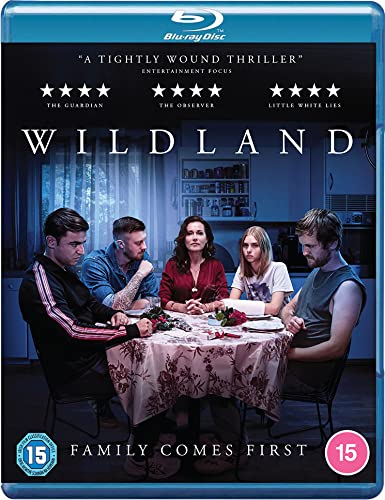 Blu-ray cover for "Wildland" featuring five people seated around a table.
