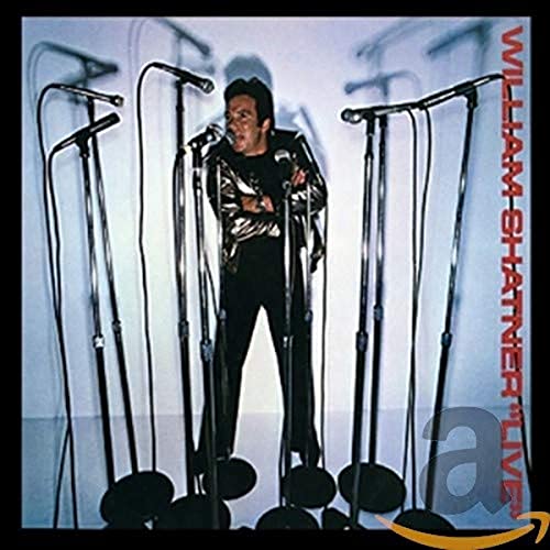William Shatner stands among many microphones on a CD cover.