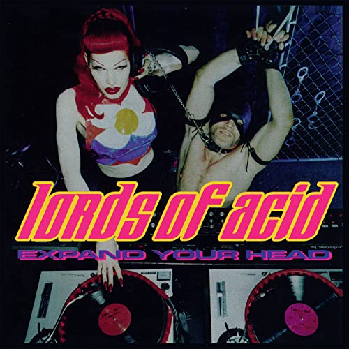 CD cover for Lords Of Acid’s “Expand Your Head” featuring two figures in BDSM attire.
