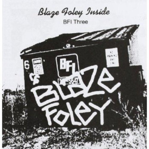 CD cover: black and white image of a graffiti-covered shed.