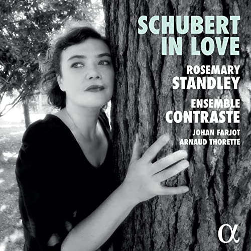 BlackCSCSB&W album cover of a woman leaning against a tree with text.