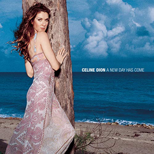 Celine Dion album cover, woman by a tree and ocean.
