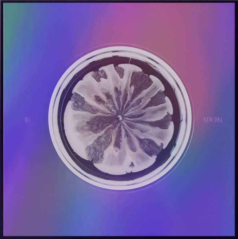 CD cover for XG’s “New DNA” featuring a spiral, abstract design.