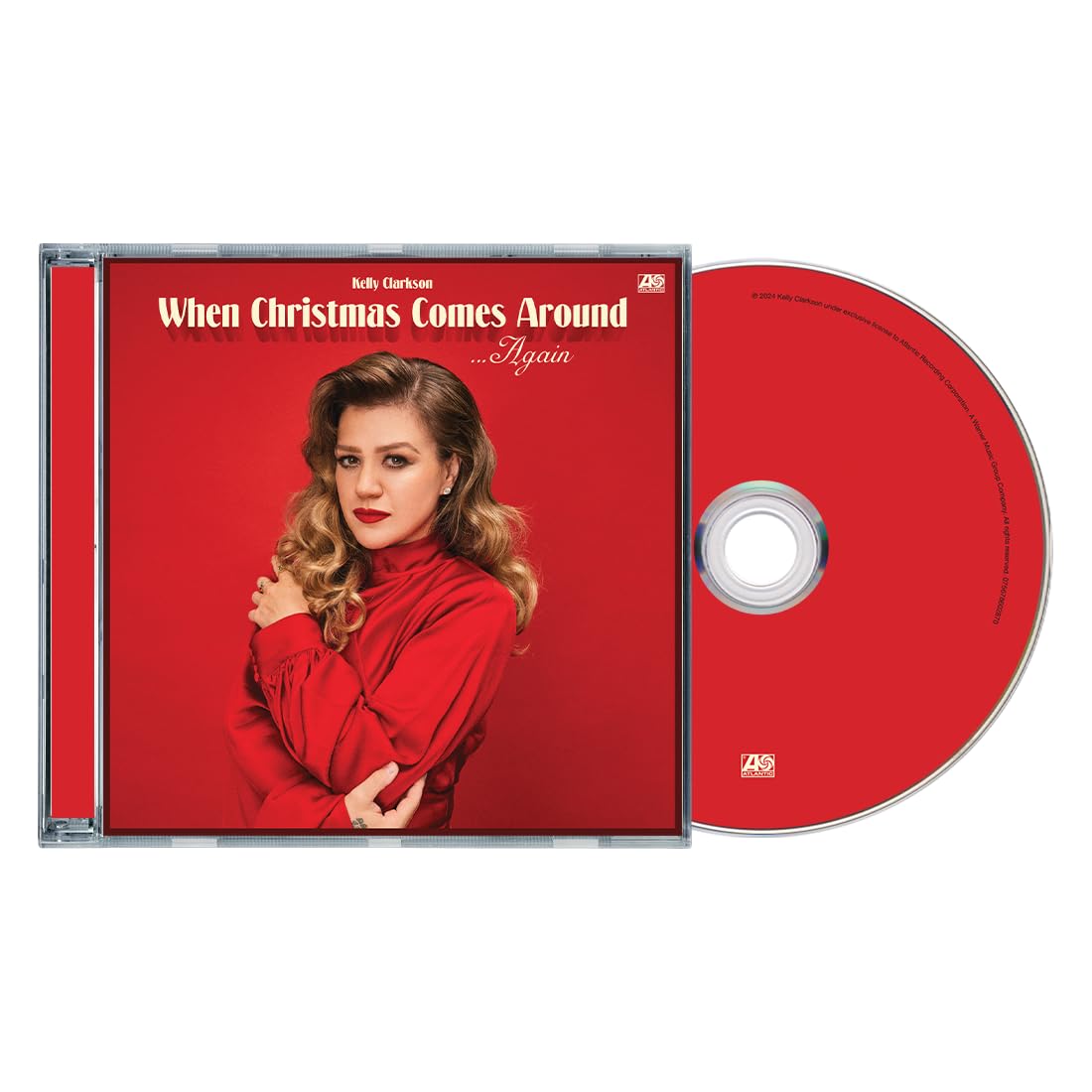 CD case featuring Kelly Clarkson in red, with album title "When Christmas Comes Around.