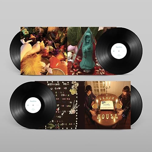 Double vinyl record of Beach House’s “Devotion” with colorful, surreal album art.