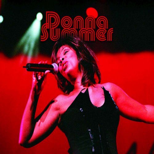 Donna Summer singing into a microphone on a red stage.