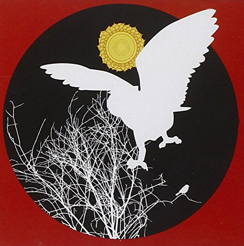 CD cover: white owl silhouette against a black circle with a gold sun.