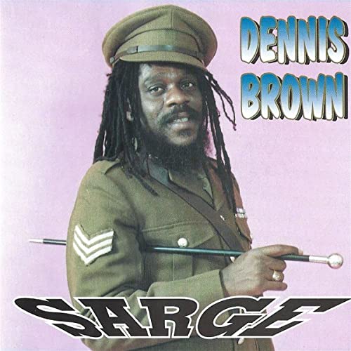 CD cover of Dennis Brown in a military uniform holding a baton.