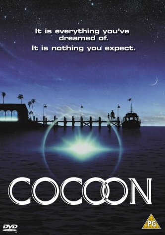 DVD cover for "Cocoon" featuring a pier, glowing orb, and starry sky.