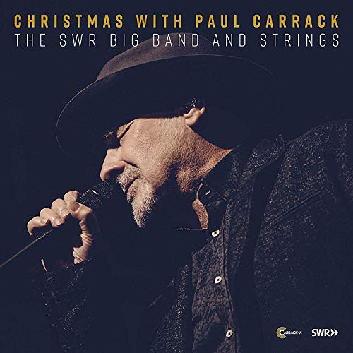 Paul Carrack album cover featuring a portrait of the singer at a microphone.