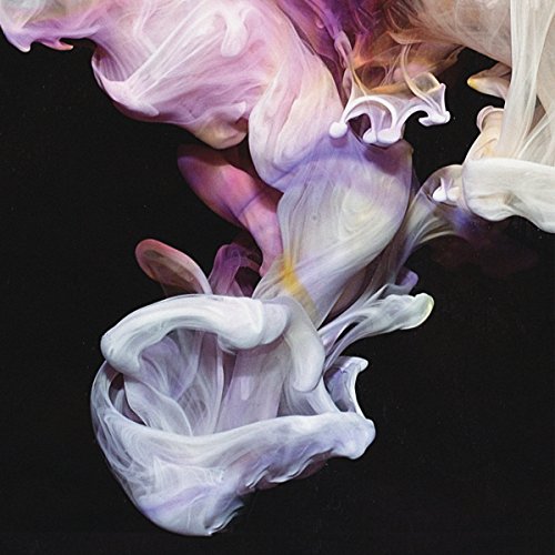 Abstract swirls of purple, white, and yellow paint against a black background.