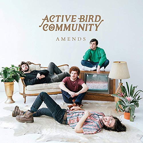 Album cover for Active Bird Community’s “Amends” featuring four people lounging.