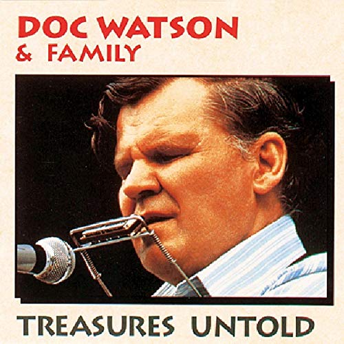 Doc Watson portrait on CD cover, playing guitar into a microphone.