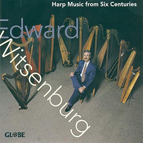 Edward Witsenburg sits among various harps on a CD cover.