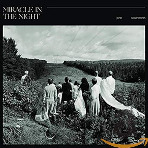 CD cover: black and white landscape with figures, titled "Miracle In The Night".