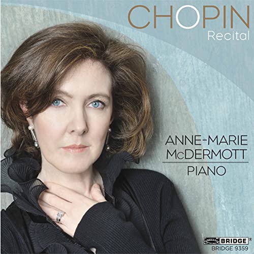 CD cover featuring pianist Anne-Marie McDermott, portrait, light blue background.