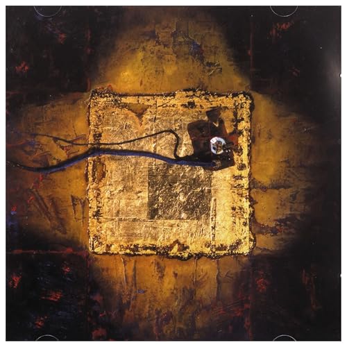 Abstract album cover with gold and dark brown textures, a blue line.