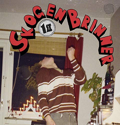 CD cover: man with raised arms, candles, and retro interior.