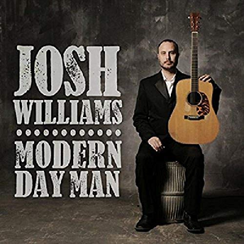Josh Williams album cover: man with guitar, dark background, text.