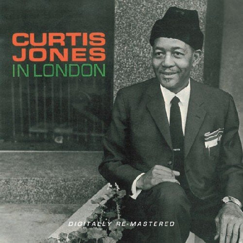 Curtis Jones album cover: portrait of a smiling man in a suit.