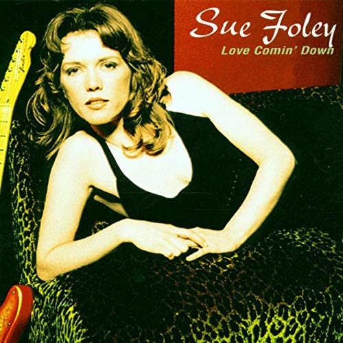 CD cover for Sue Foley’s “Love Comin’ Down” featuring a woman and guitar.