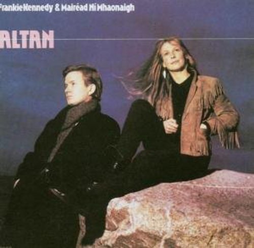 CD cover featuring two people, a man and a woman, in outdoor setting.