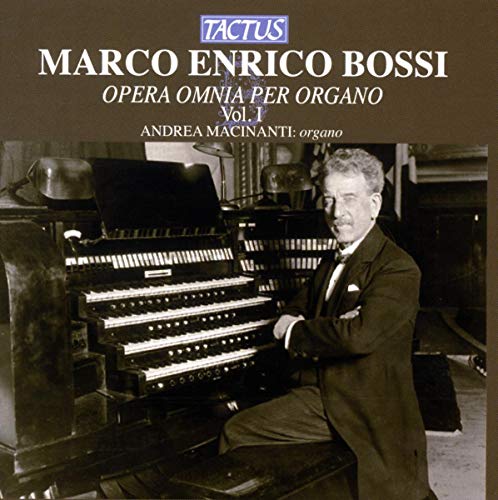 CD cover featuring a man in a suit standing beside a large pipe organ.