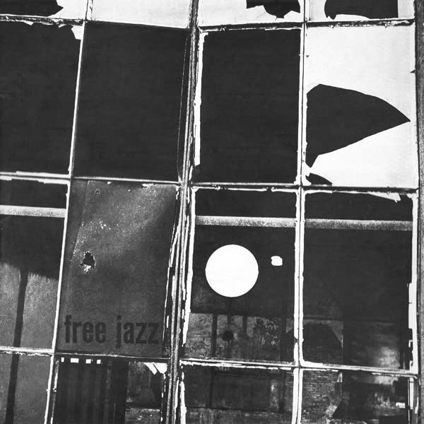 Black and white album cover with geometric shapes and text “free jazz”.