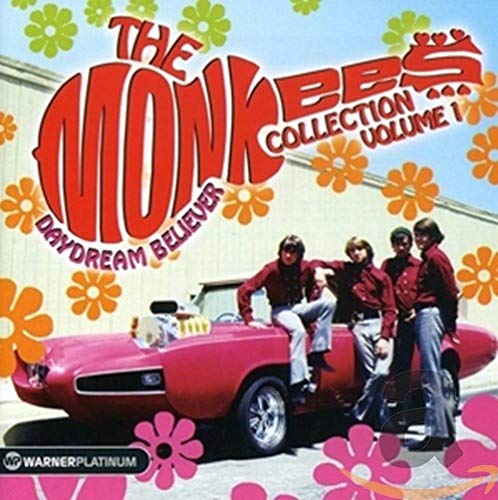 The Monkees album cover featuring the band with a pink car.