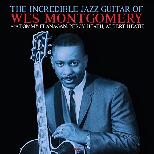 Wes Montgomery album cover featuring the guitarist with his instrument.