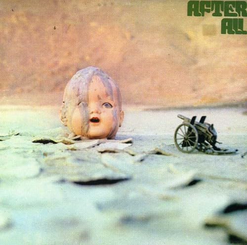 Doll head in murky water with a small, overturned wheelchair.