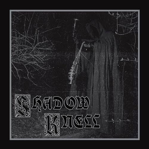 Hooded figure with a trumpet stands among bare branches, dark aesthetic.