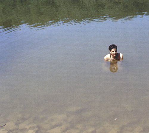 CD cover: woman submerged in water, looking at the viewer.