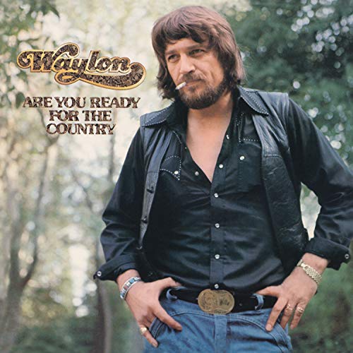 Waylon Jennings album cover, portrait of a man with a beard.