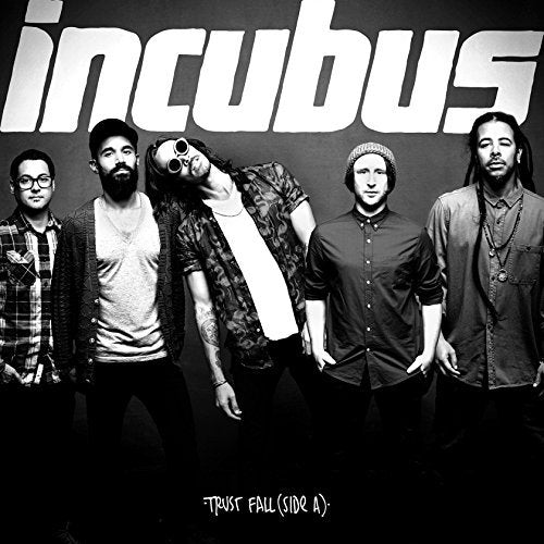 Black and white studio portrait of the five members of the band Incubus.