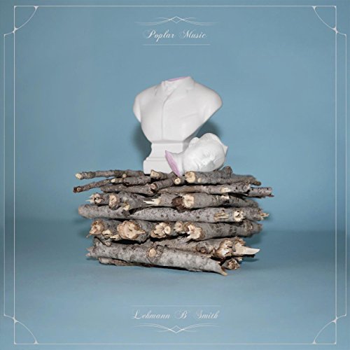 Album cover: white busts on a pile of branches, blue background.