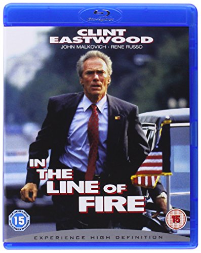 Blu-ray cover for In The Line Of Fire featuring Clint Eastwood in a suit.