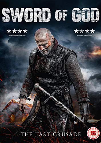 Bald man in chainmail with sword standing amidst burning buildings and smoke.