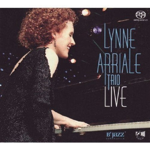 Lynne Arriale at a piano, album cover for "Live in Burghausen.