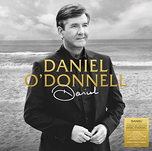Daniel O'Donnell album cover, portrait with ocean background and gold text.