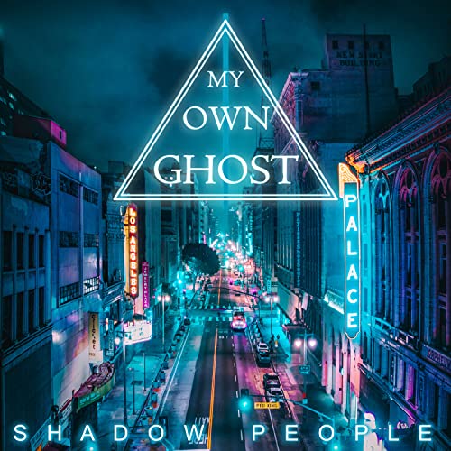 CD cover: neon triangle over a nighttime city street scene.
