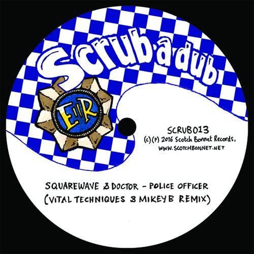 Vinyl record label with blue and white checkerboard pattern, text, and logo.