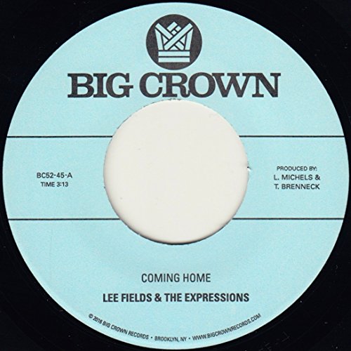 Blue and black 7-inch vinyl record label with text and central hole.