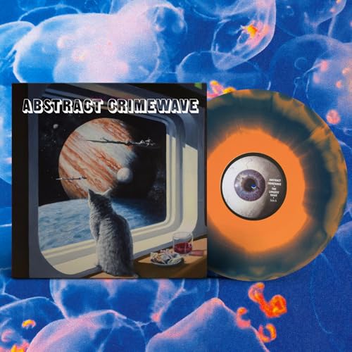 Album cover and vinyl record featuring a cat looking at a planet from space.