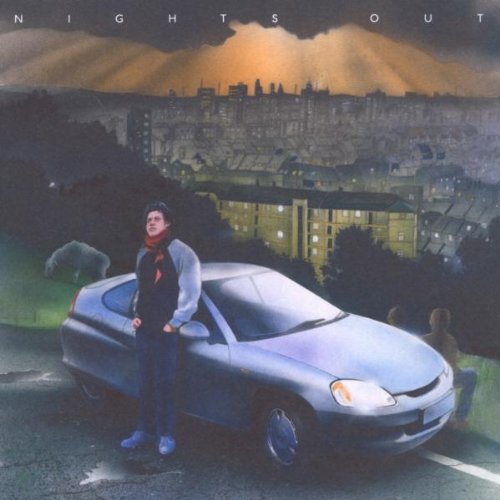 Album cover: man by car, city skyline, and a distant bear.