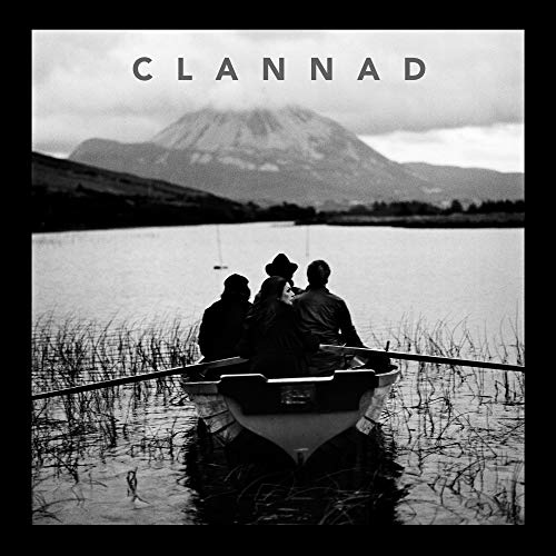 Black and white album cover: four figures in a boat on a lake.